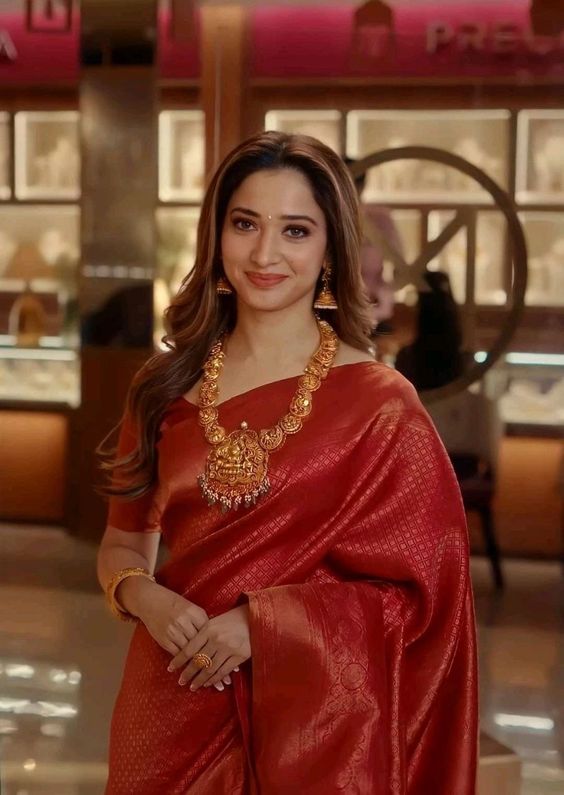 Tamanna Bhatia looking gorgeous she wear party wear red silk saree